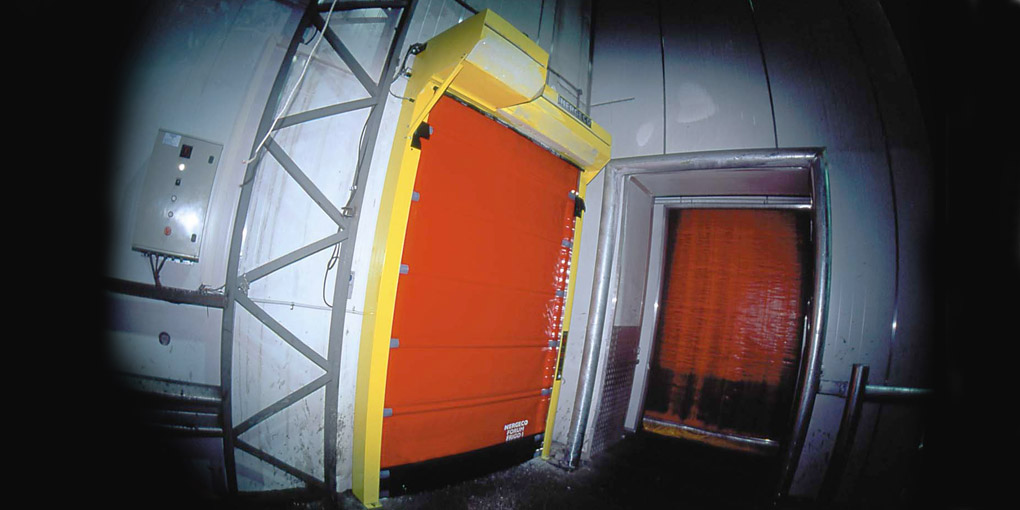 High speed freezer door with motor on the front